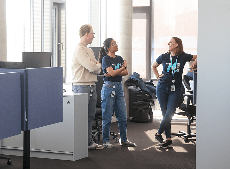 People talking to each other in an office landscape 